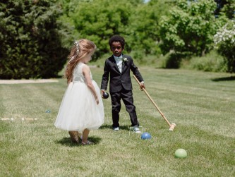 Flower girl and ring bearer playing croquet, Jemira Richards photo